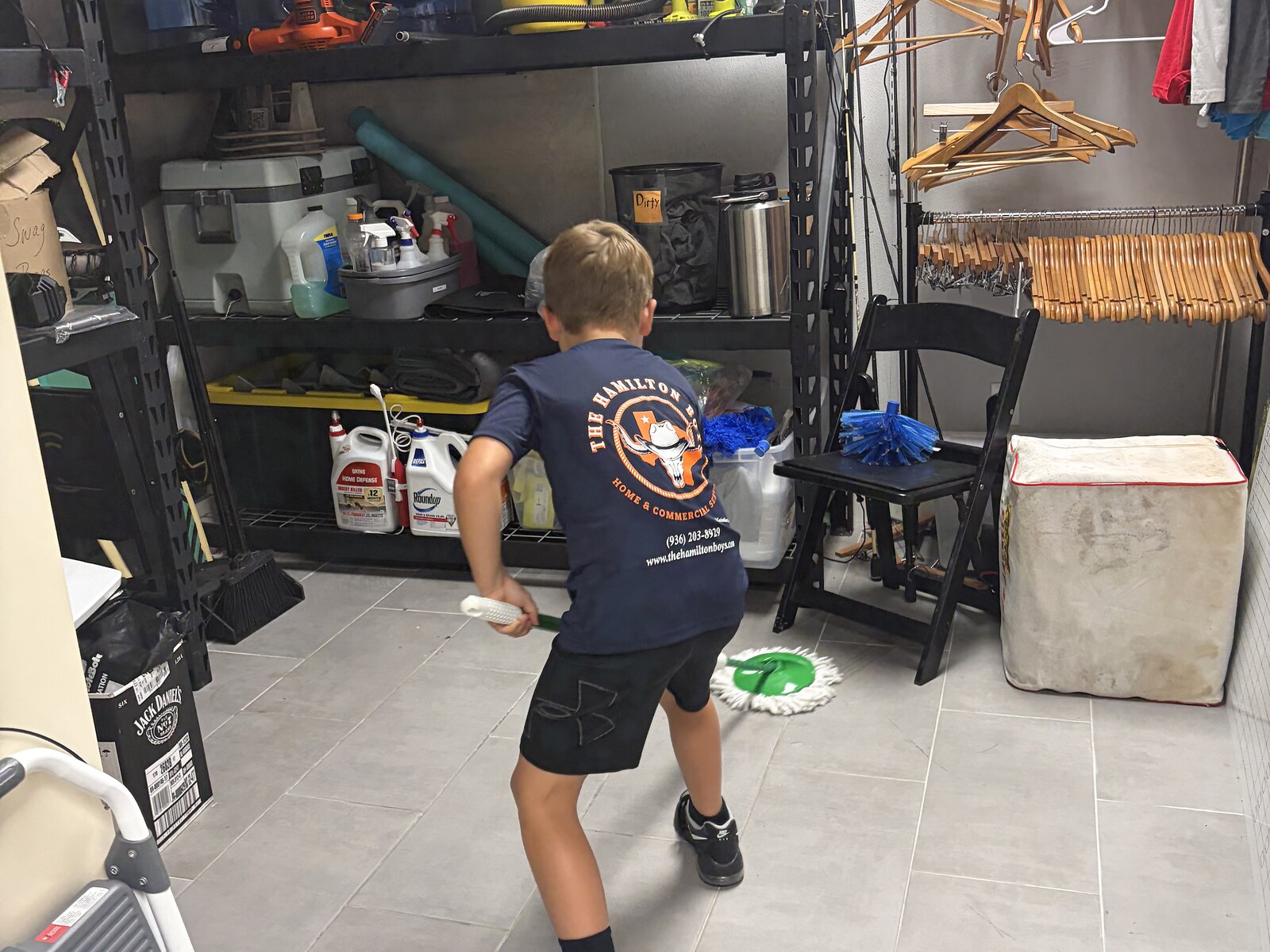 Hamilton Boys crew cleaning storage and supply area